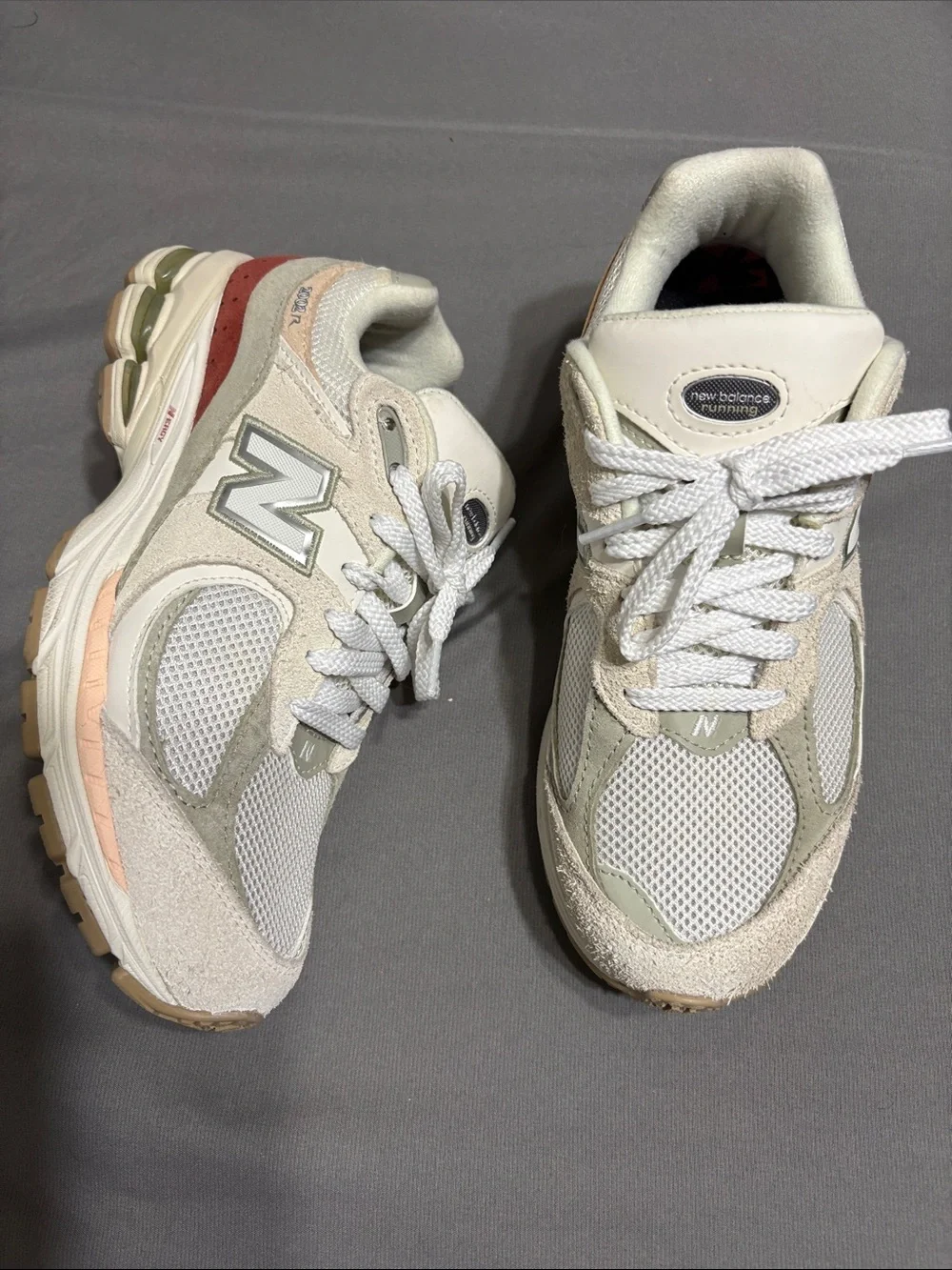 New Balance 2002R Women’s Cream with Light Green & Pink Accent Sneakers